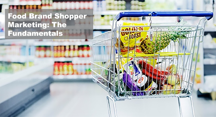 grocery cart with food in store